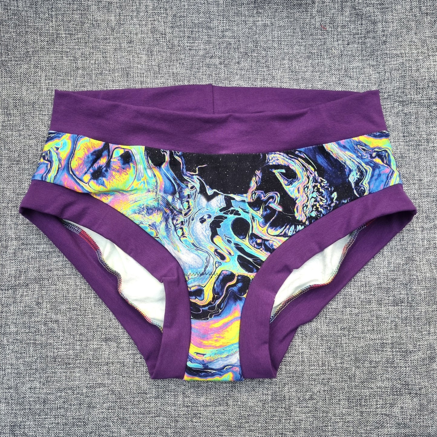 Briefs - Oil Slick